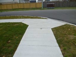 Concrete sidewalk in a neighborhood