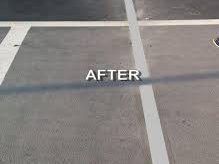 Concrete surface with previously cracked areas that have been filled with caulk. The caulked sections show a smooth, even finish where the cracks were repaired. The surrounding concrete is clean and free of damage, highlighting the contrast between the repaired and original areas