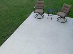 Newly installed rectangular outdoor concrete patio